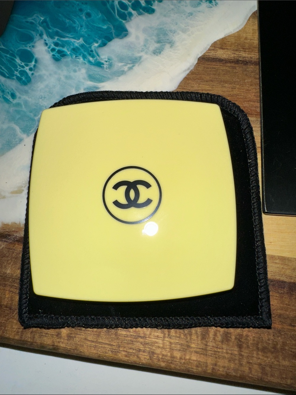 AUTHENTIC CHANEL Yellow Compact Charger with Black Logo